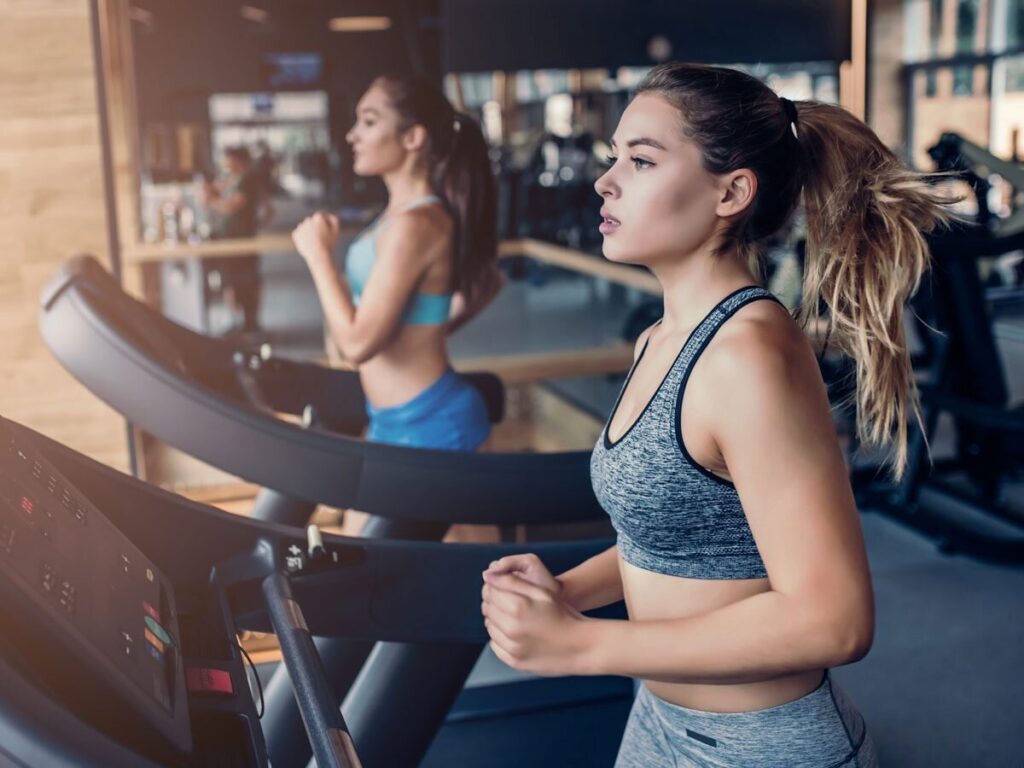 Woman building cardiovascular endurance on a treadmill